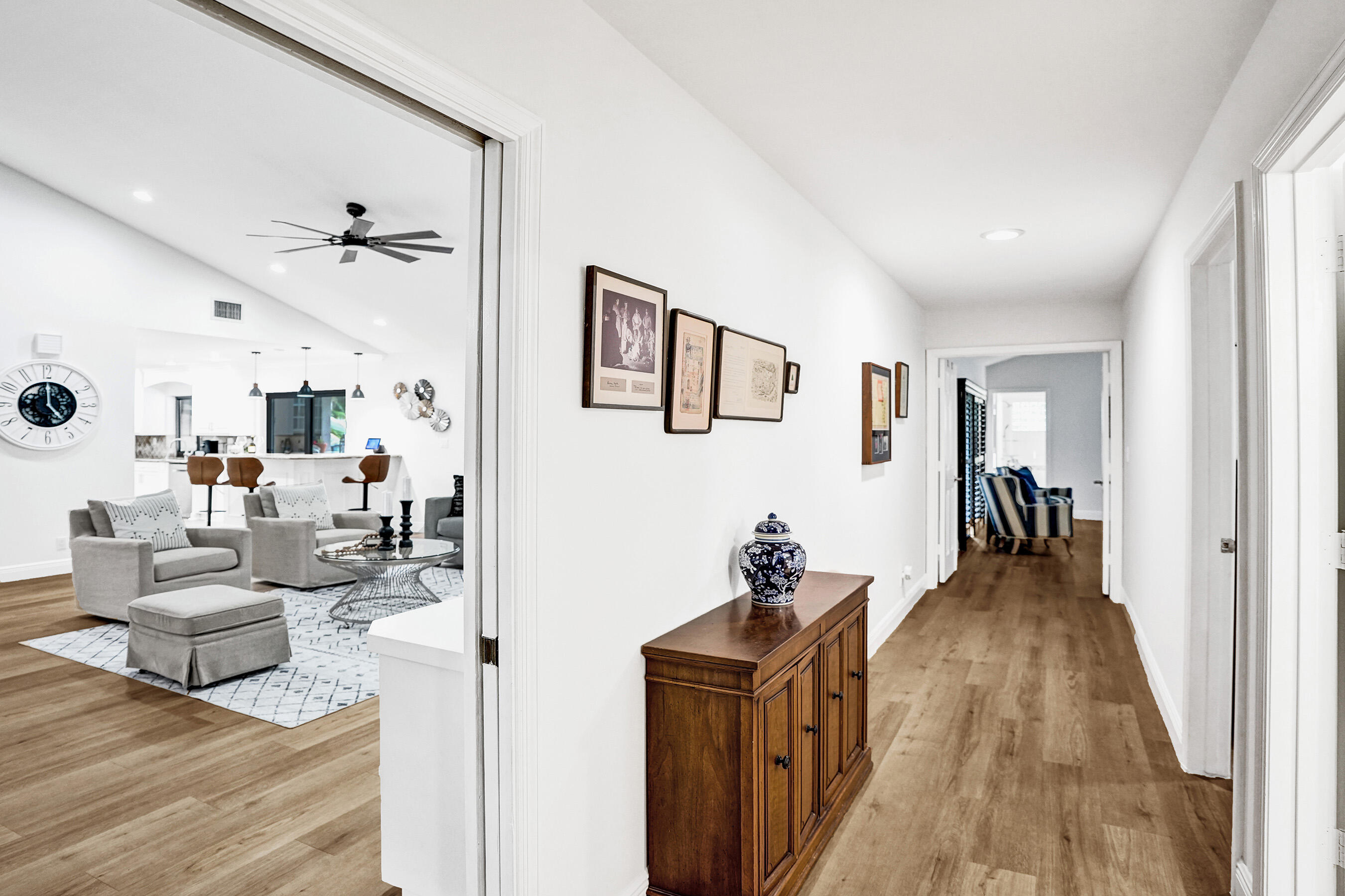 2413 Northwest 40th Circle Boca Raton, FL 33431 - Photo 25 of 66 a view of a livingroom with furniture hardwood floor and a living room