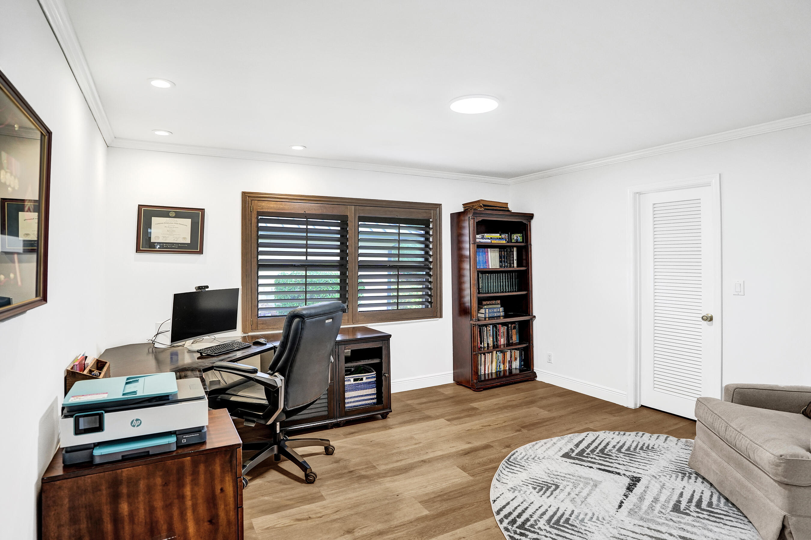 2413 Northwest 40th Circle Boca Raton, FL 33431 - Photo 34 of 66 a view of a livingroom with workspace and a window