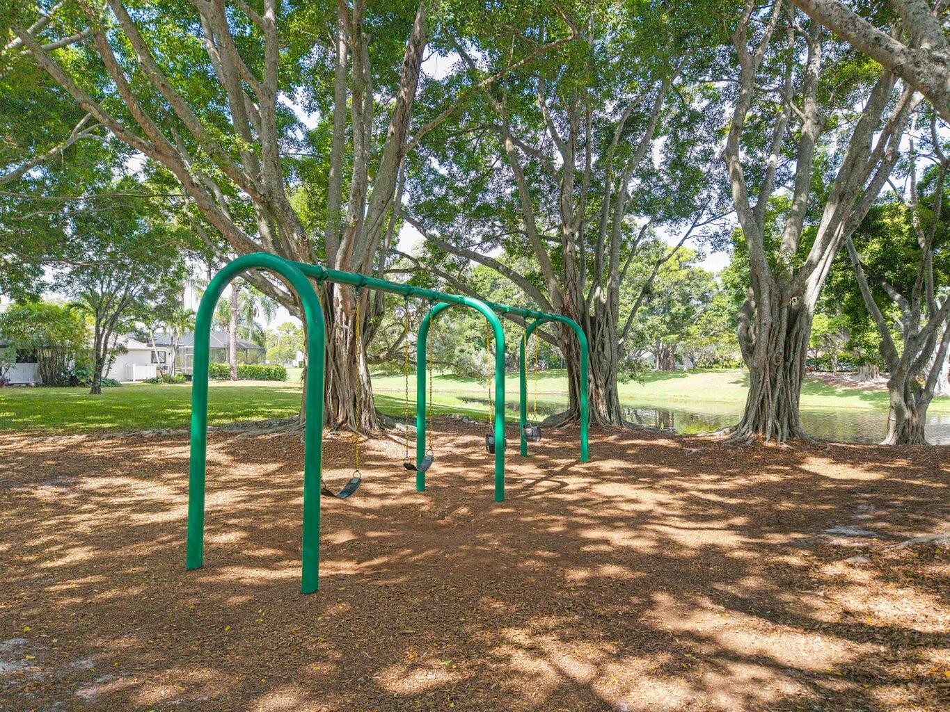 2413 Northwest 40th Circle Boca Raton, FL 33431 - Photo 64 of 66 a view of a tree in a yard