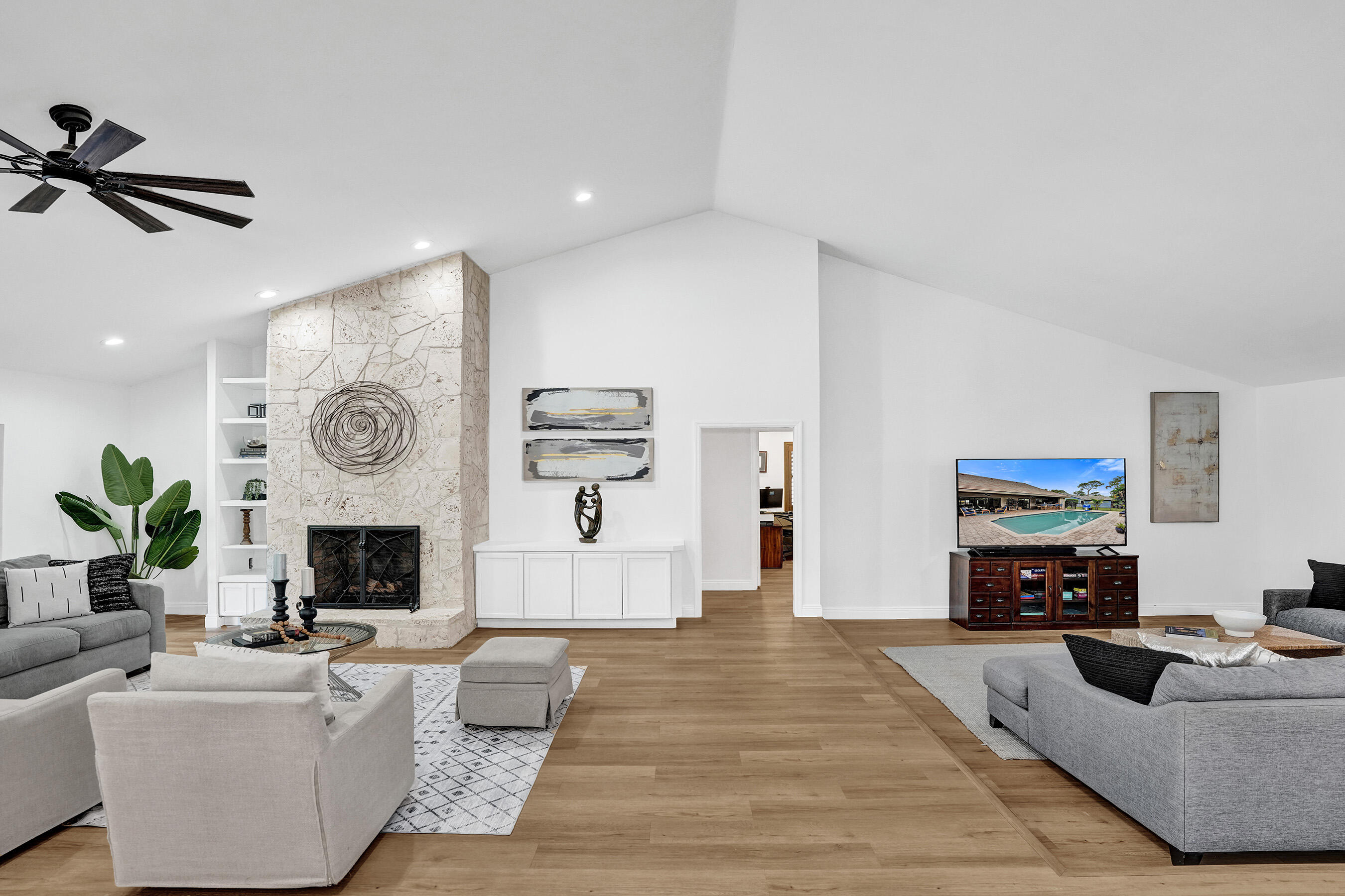 2413 Northwest 40th Circle Boca Raton, FL 33431 - Photo 9 of 66 a living room with furniture and a fireplace