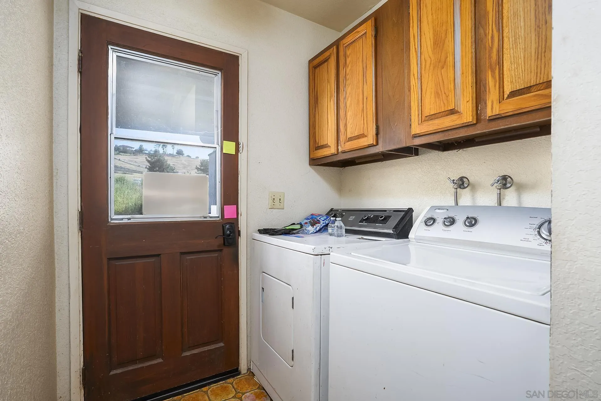 4829 Dehesa Road El Cajon, CA 92019 - Photo 8 of 14 a utility room with dryer and washer
