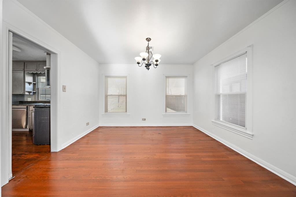 3119 Trice Avenue Waco, TX 76707 - Photo 23 of 40 an empty room with chandelier and entryway