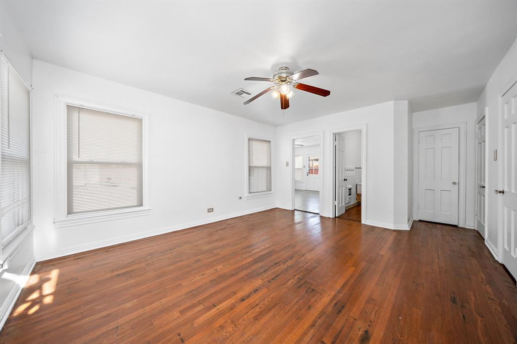 3119 Trice Avenue Waco, TX 76707 - Photo 32 of 40 an empty room with wooden floor and windows