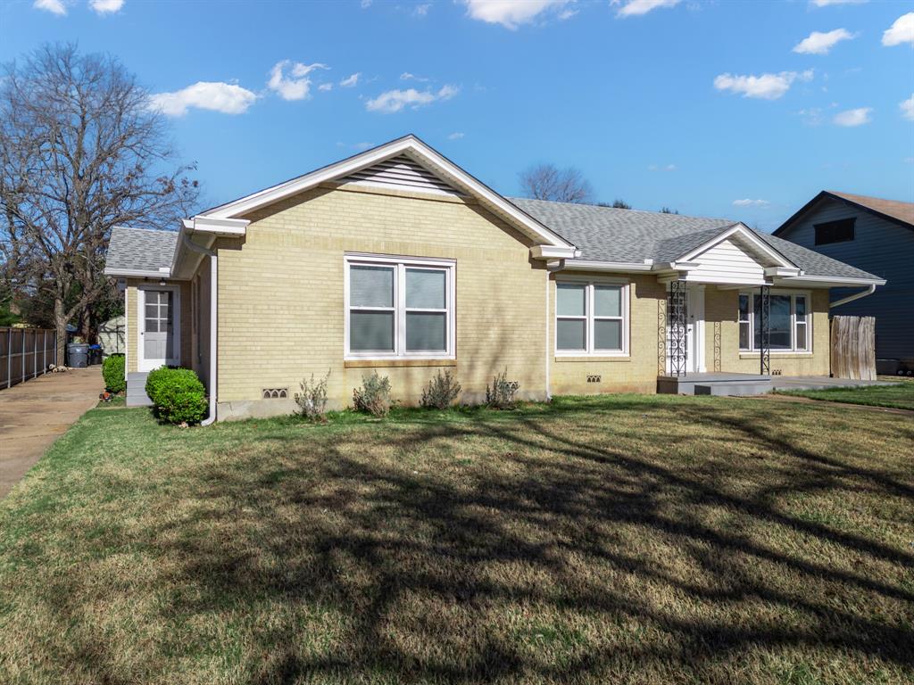 3119 Trice Avenue Waco, TX 76707 - Photo 6 of 40 a front view of a house with a yard