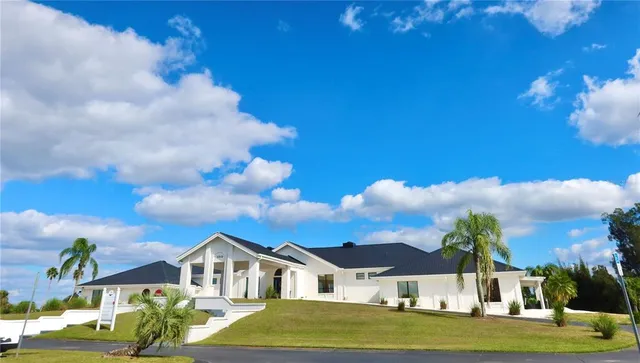 a sign board with a yard