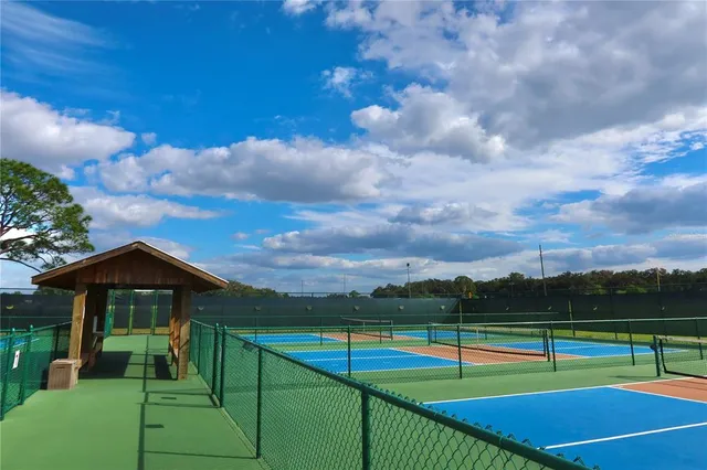 a view of a park with swings and slides