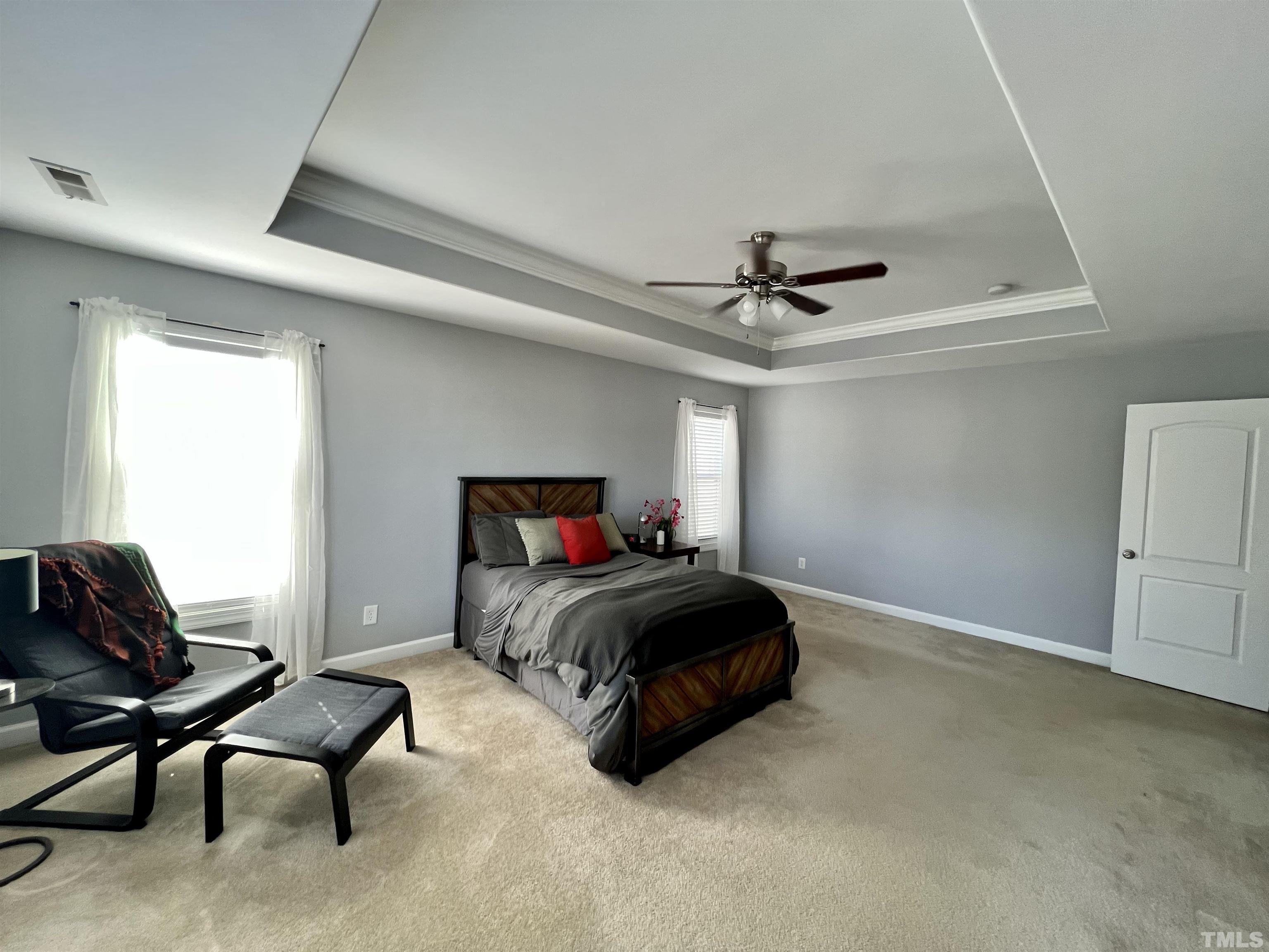 2231 Stoney Spring Drive Raleigh, NC 27610 - Photo 5 of 18 a bed room with a bed and a couch
