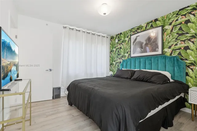 a view of a hallway with washer and dryer