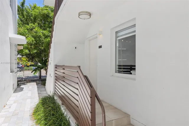 a view of entryway with a front door