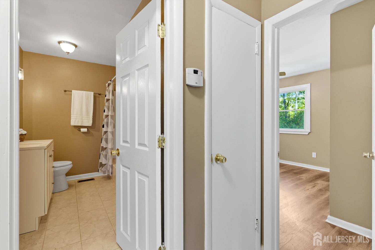 2092 Main Road Newfield, NJ 08344 - Photo 14 of 29 a bathroom with a toilet sink