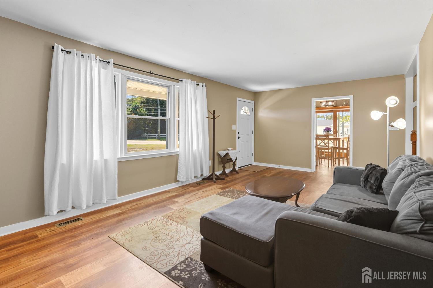 2092 Main Road Newfield, NJ 08344 - Photo 4 of 29 a living room with furniture and a window
