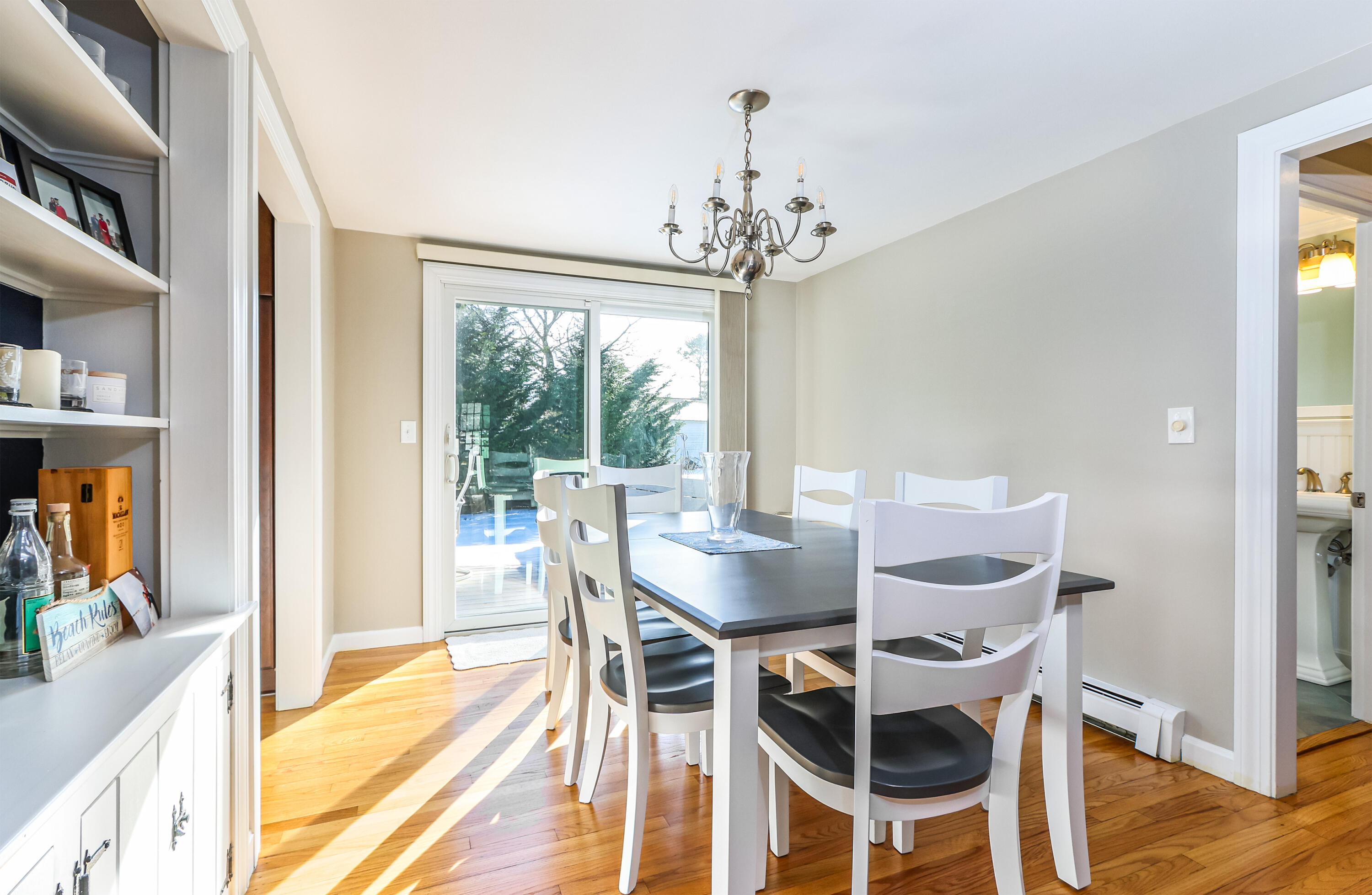 15 Captain Small Road South Yarmouth, MA 02664 - Photo 13 of 22 a view of a dining room with furniture window and wooden floor