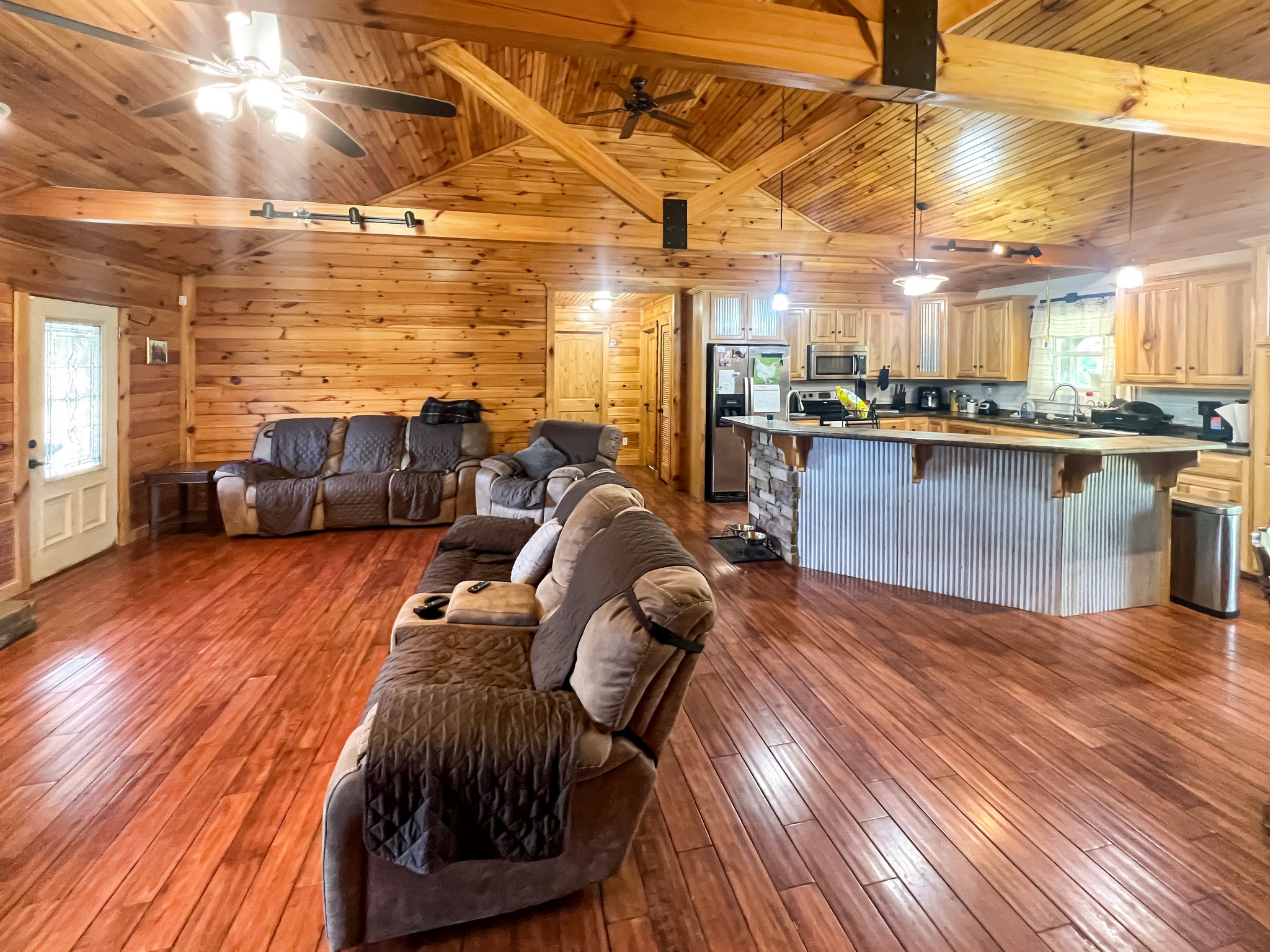 9516 Bakerton Road Red Boiling Springs, TN 37150 - Photo 23 of 60 a living room with furniture and a wooden floor