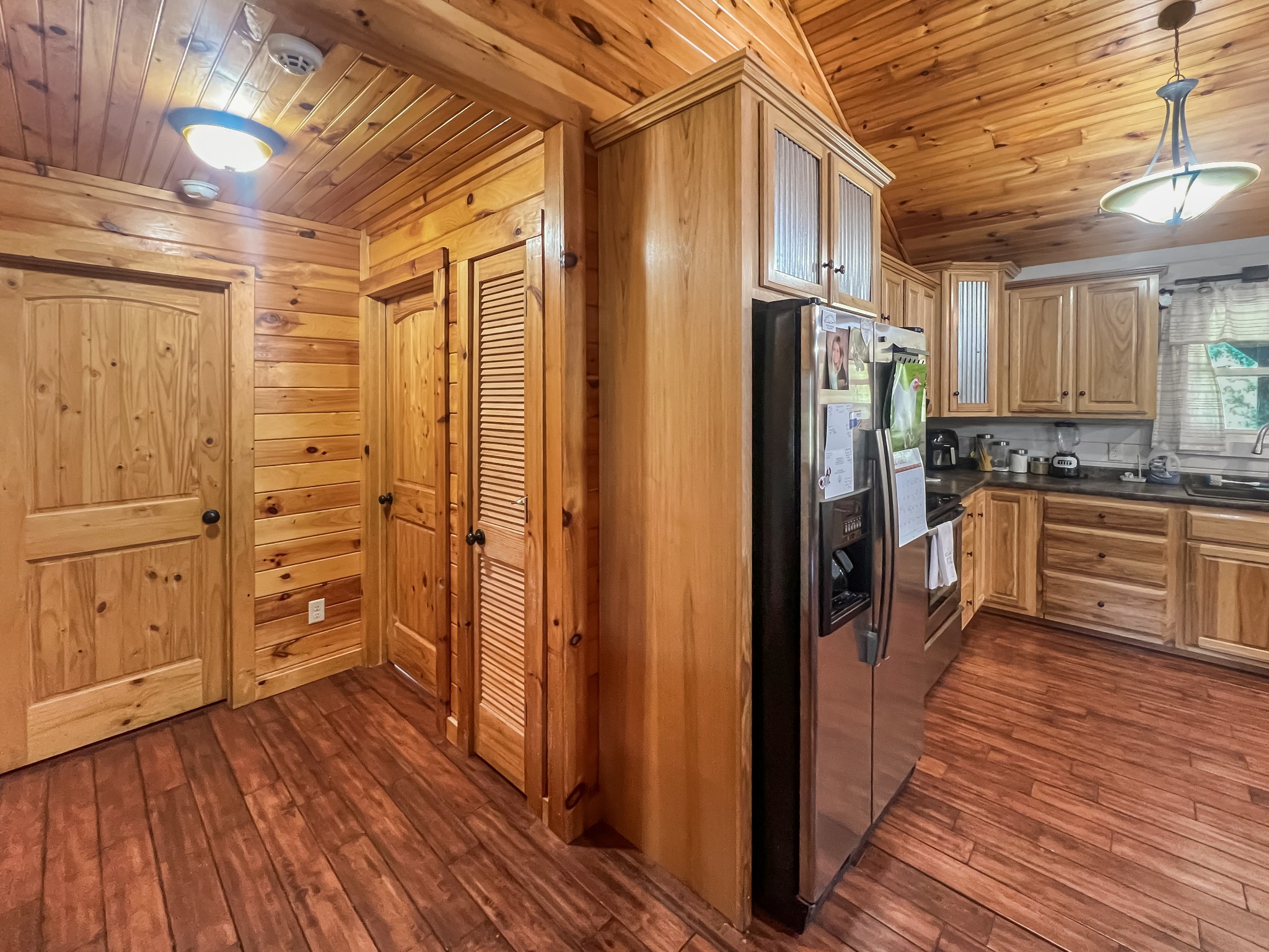 9516 Bakerton Road Red Boiling Springs, TN 37150 - Photo 24 of 60 a kitchen with stainless steel appliances granite countertop a refrigerator and a stove top oven