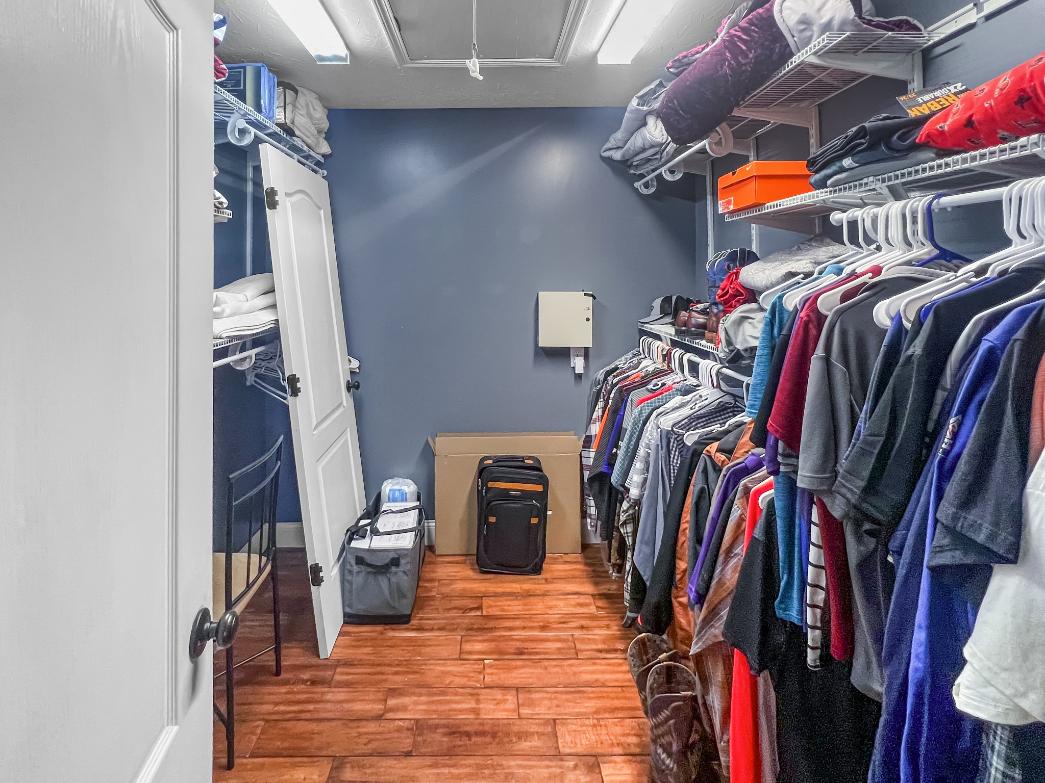 9516 Bakerton Road Red Boiling Springs, TN 37150 - Photo 30 of 60 a view of walk in closet with clothes and shoes