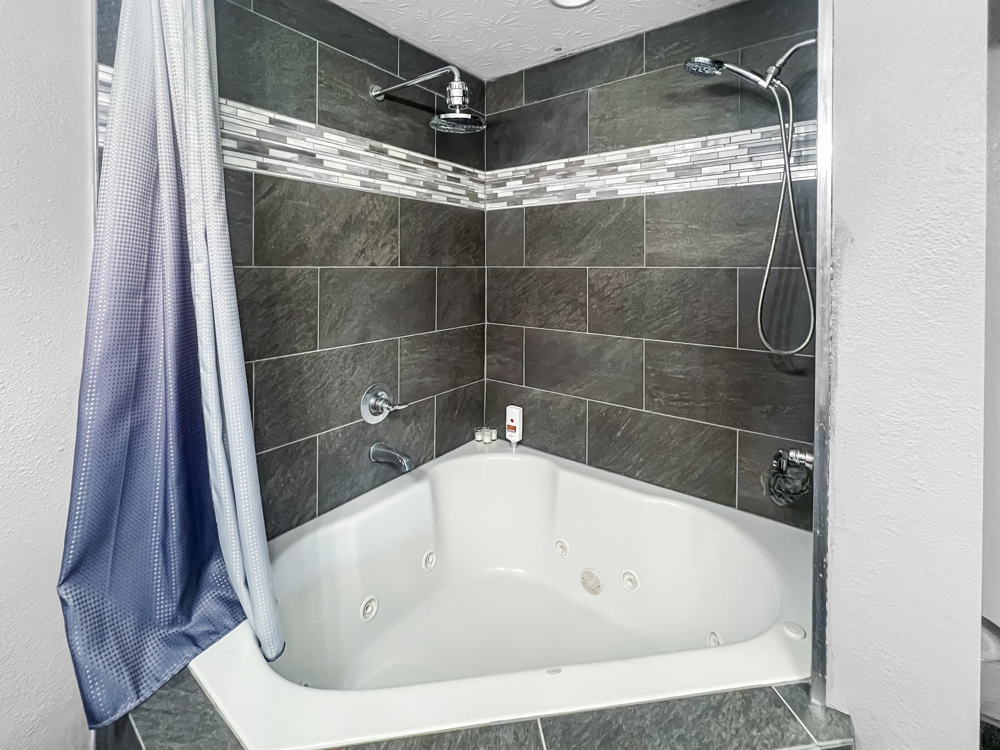 9516 Bakerton Road Red Boiling Springs, TN 37150 - Photo 32 of 60 a white bath tub sitting in a bathroom