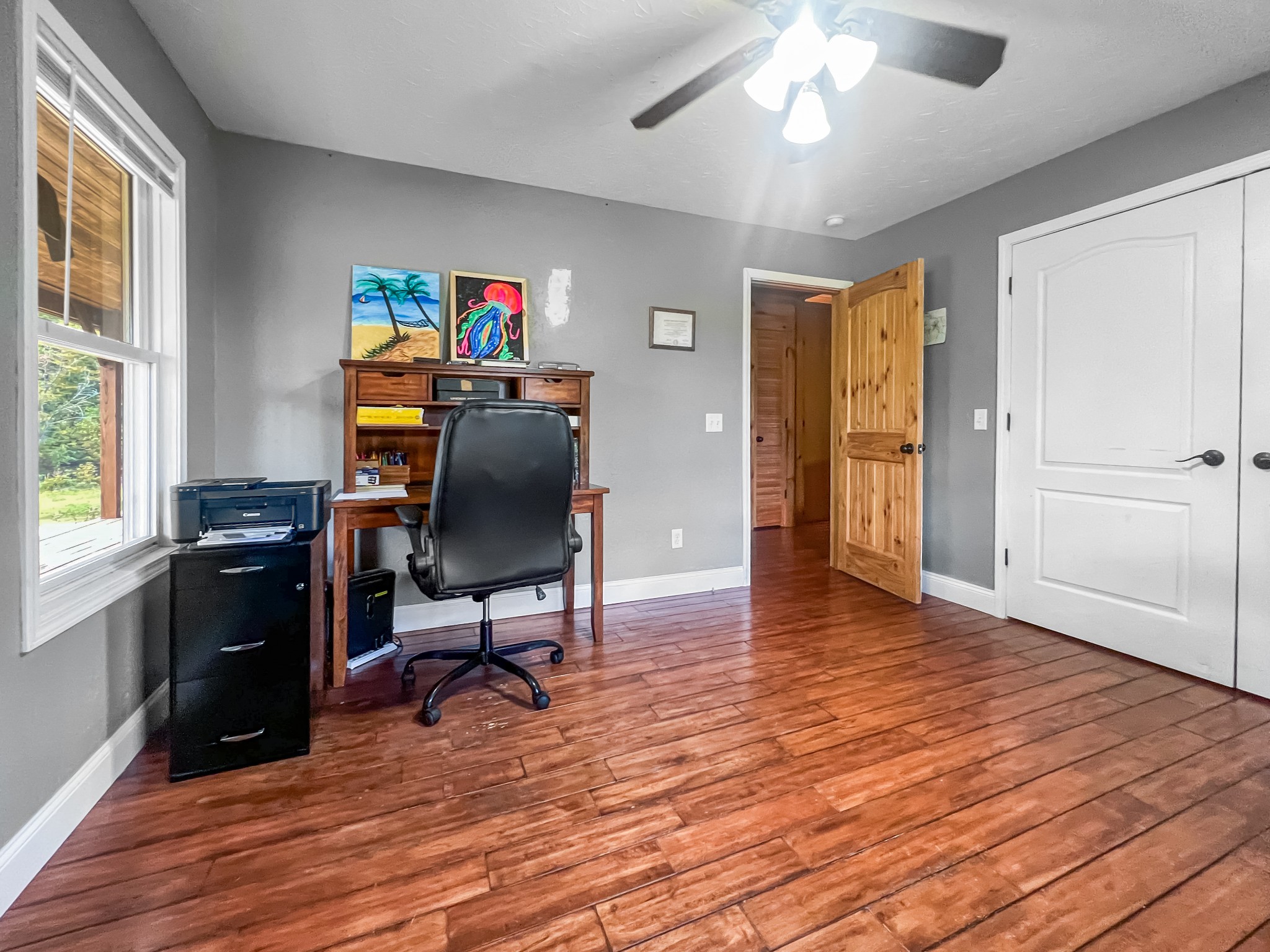 9516 Bakerton Road Red Boiling Springs, TN 37150 - Photo 34 of 60 a view of a workspace with furniture and a window