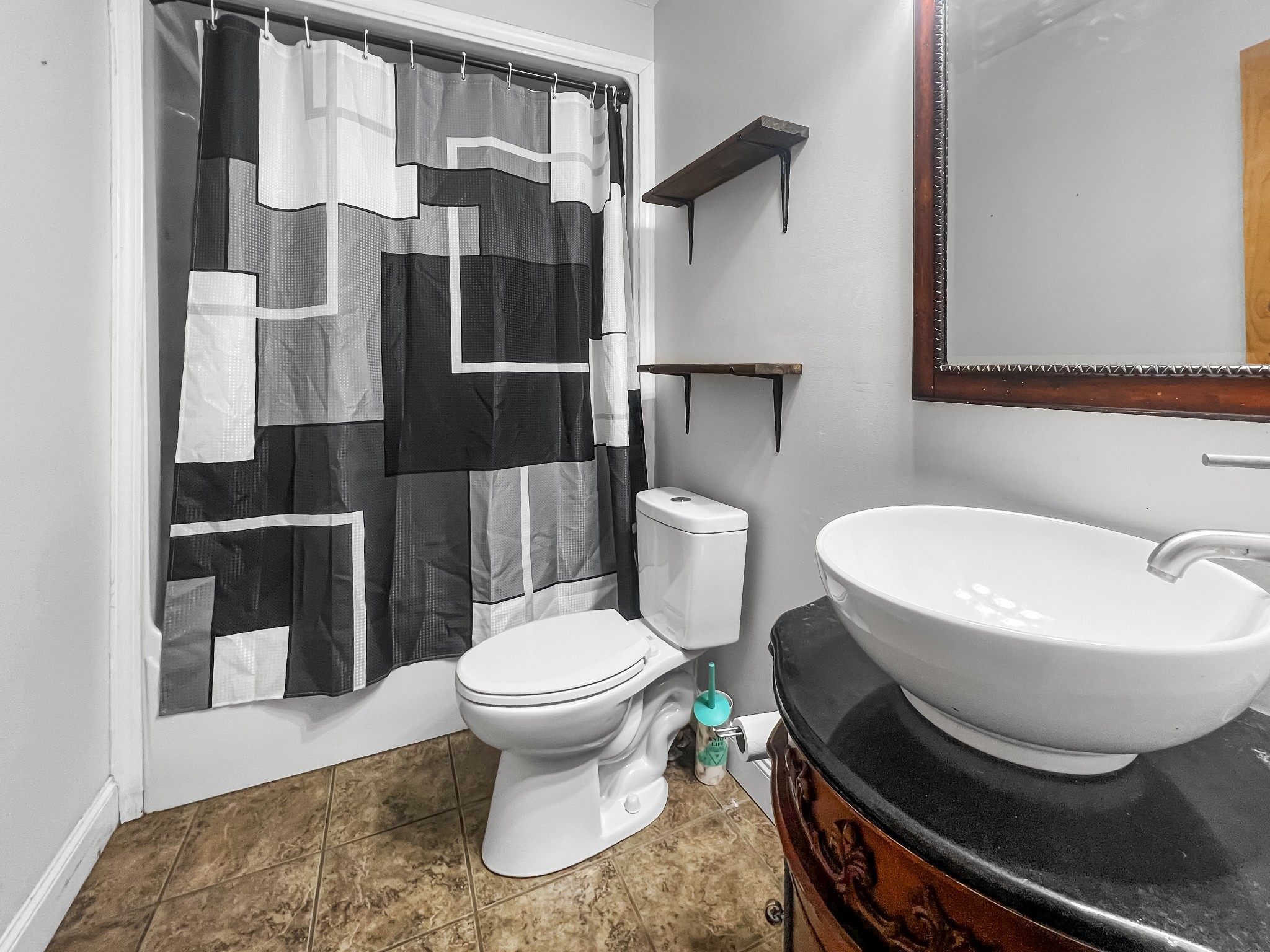 9516 Bakerton Road Red Boiling Springs, TN 37150 - Photo 37 of 60 a bathroom with a toilet and a sink