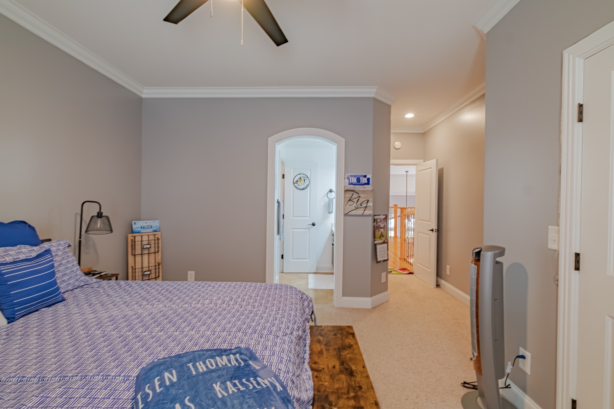 356 Ridgecrest Drive Winchester, TN 37398 - Photo 41 of 73 a bedroom with a bed and a chandelier