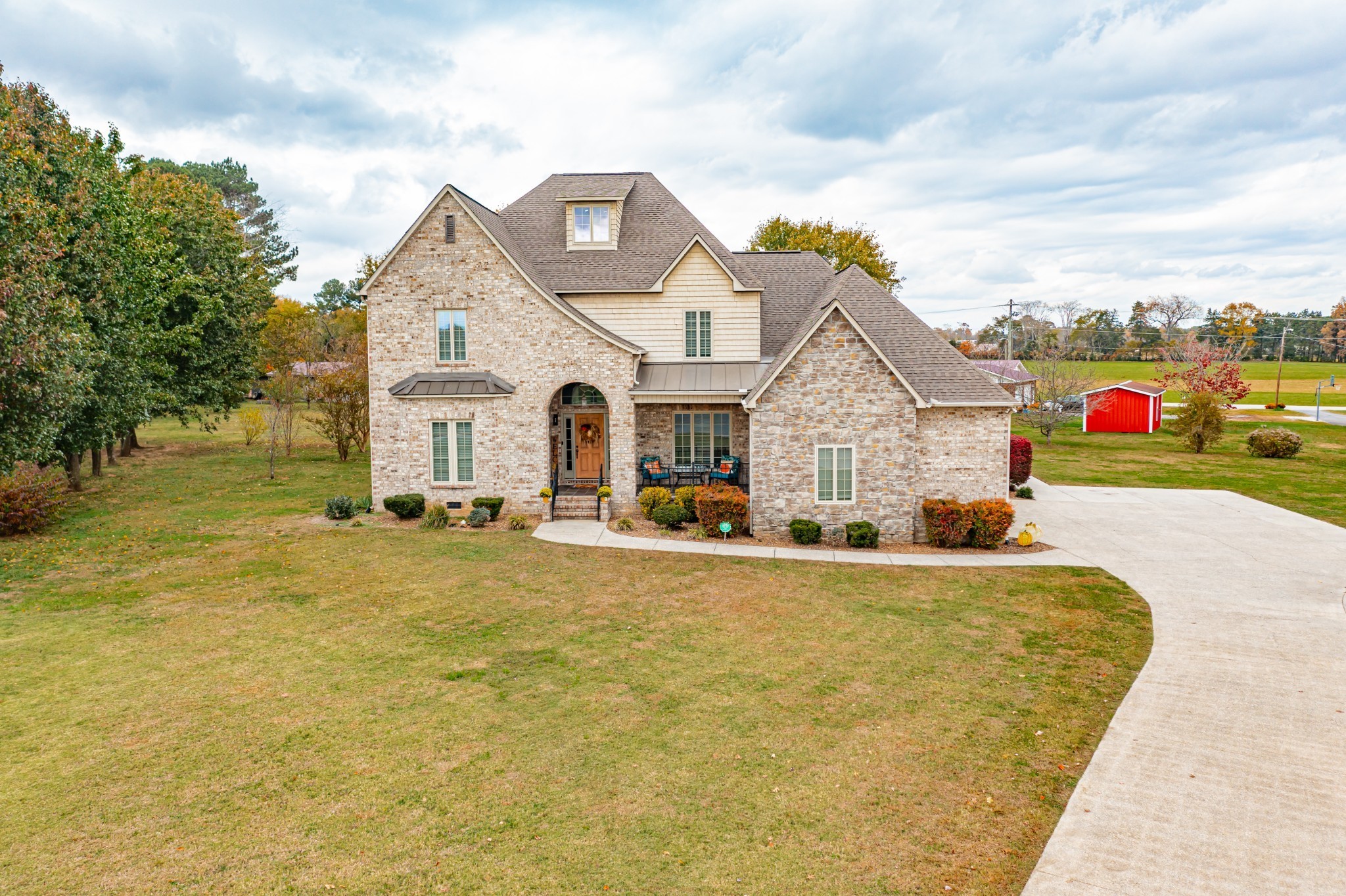 356 Ridgecrest Drive Winchester, TN 37398 - Photo 62 of 73 a front view of a house with a yard and garage