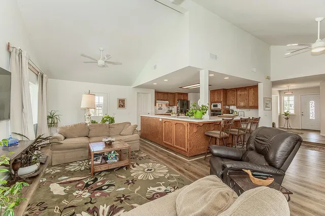 a view of city and mountain with ocean view