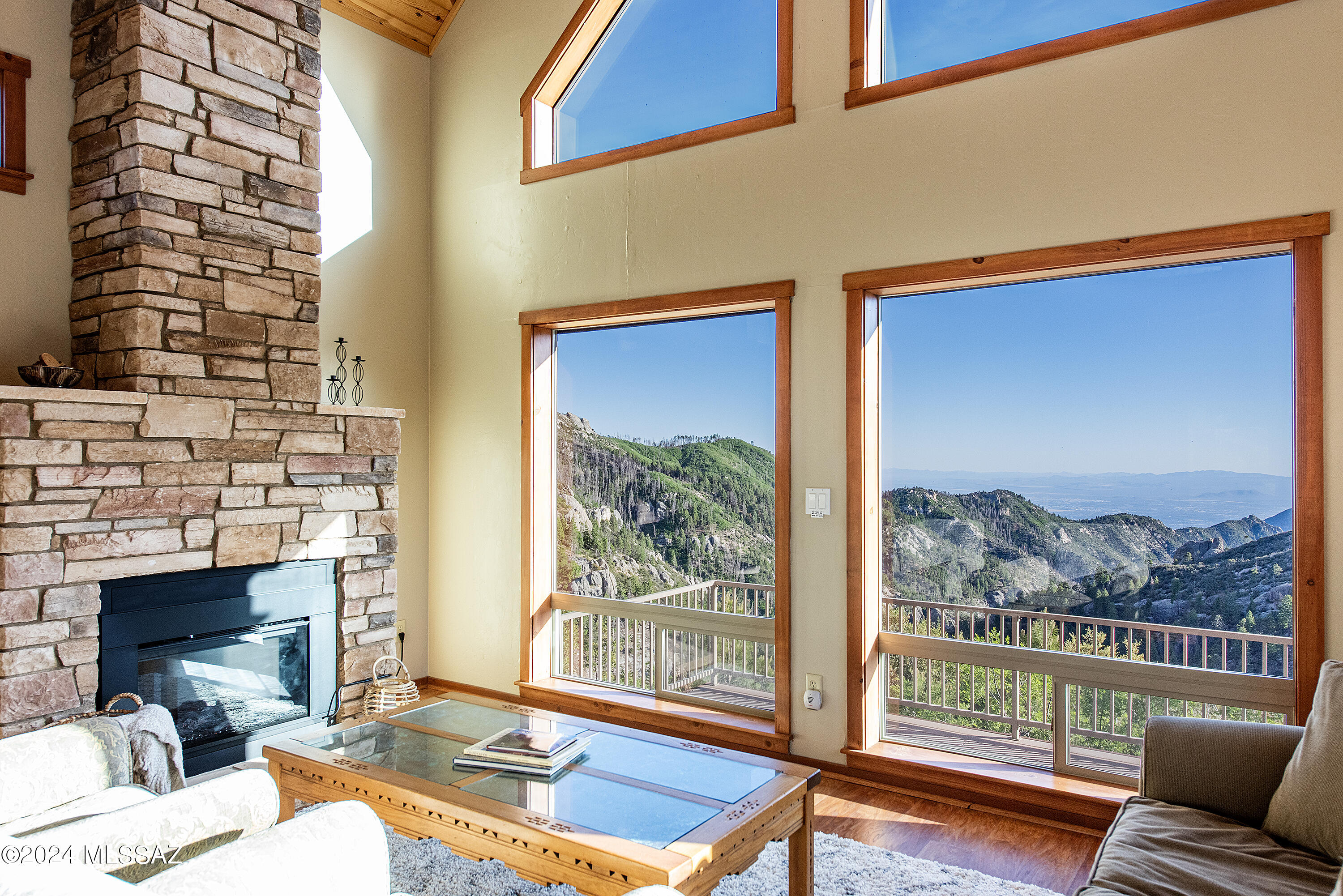 12063 North Fern Ridge Tucson, AZ 85739 - Photo 9 of 46 Large Rock Fireplace & Views of The City