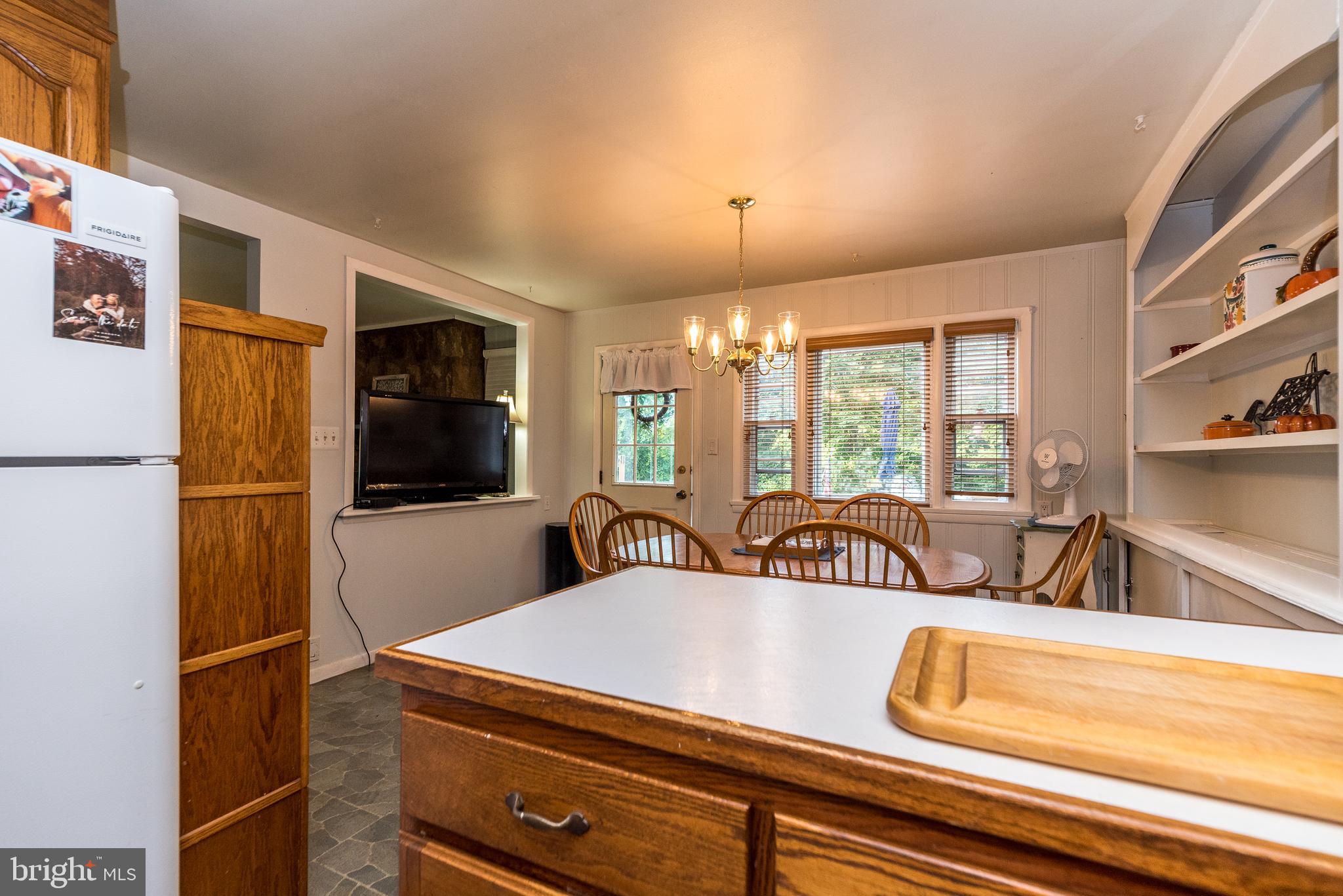 6634 Phillips Mill Road New Hope, PA 18938 - Photo 14 of 35 Dining room door to deck