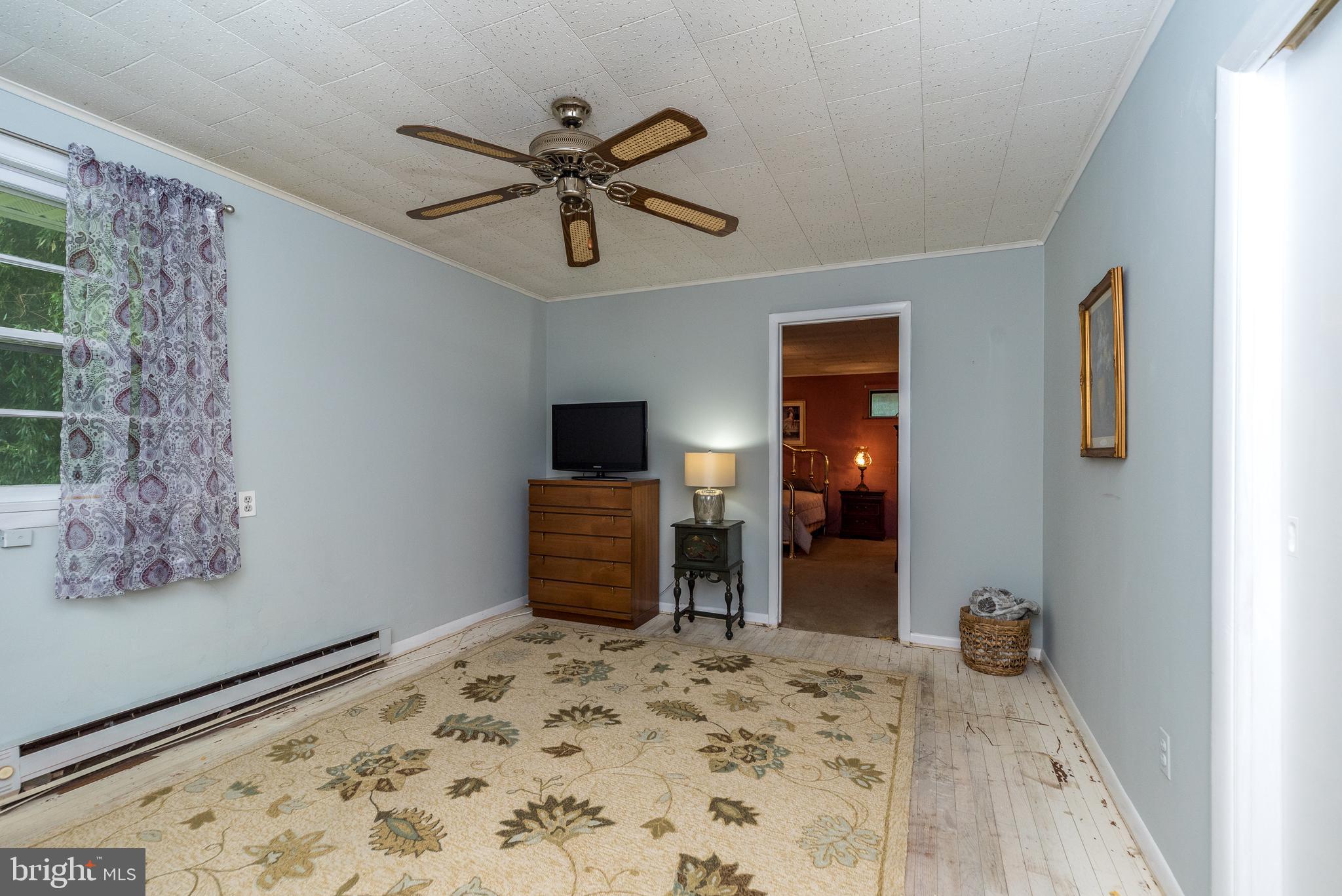 6634 Phillips Mill Road New Hope, PA 18938 - Photo 16 of 35 Sitting Room for Primary bedroom- wood floors