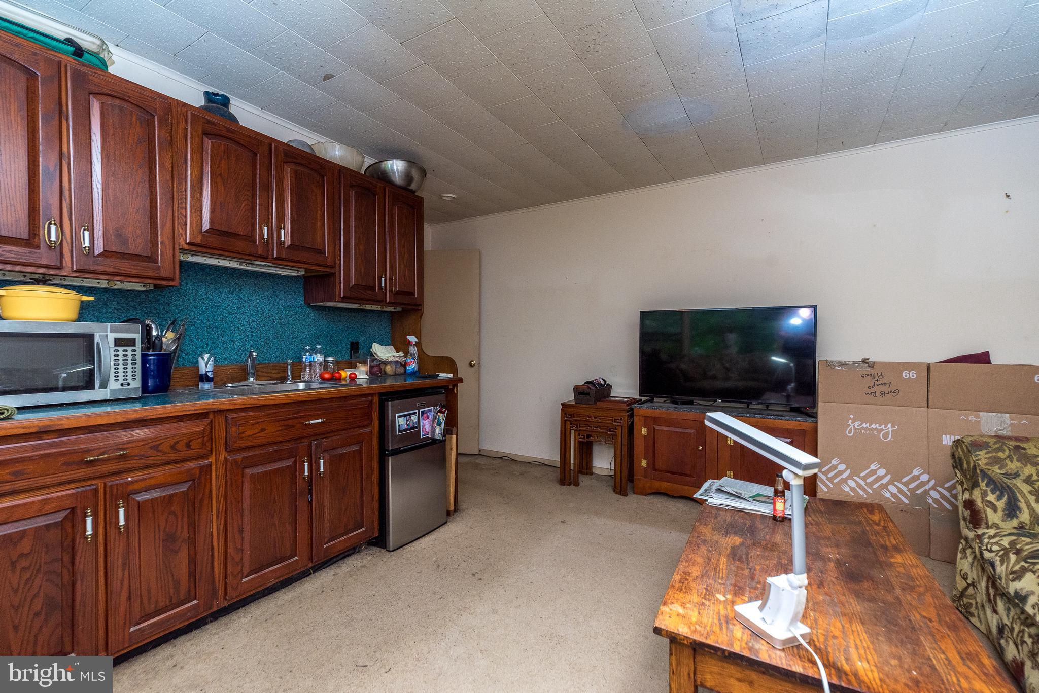 6634 Phillips Mill Road New Hope, PA 18938 - Photo 27 of 35 Wet bar & under counter refrigerator
