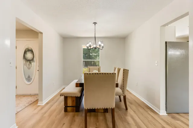 a bedroom with a bed and ceiling fan