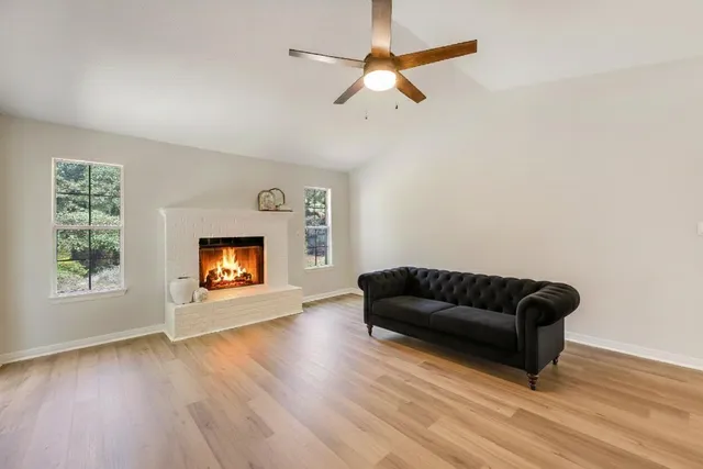 a kitchen with granite countertop a sink and a window