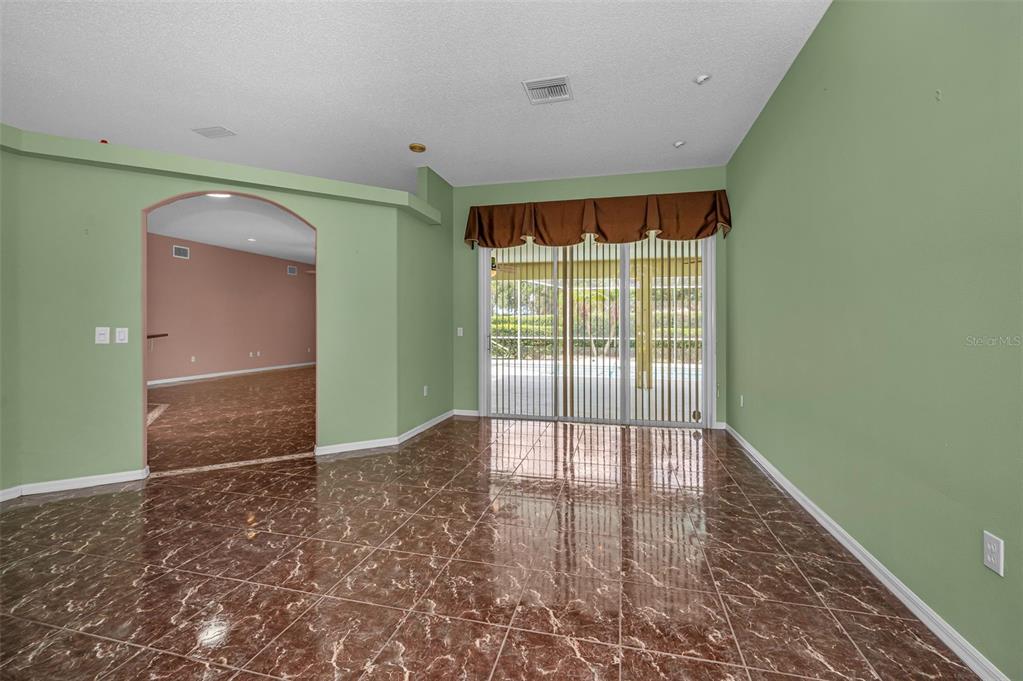 11917 Hadleigh Way Trinity, FL 34655 - Photo 12 of 84 a view of an empty room and window