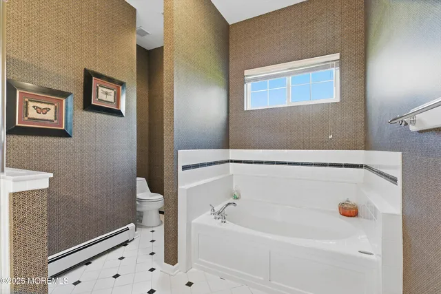 a bathroom with a bathtub