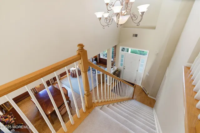 a view of a balcony with wooden floor