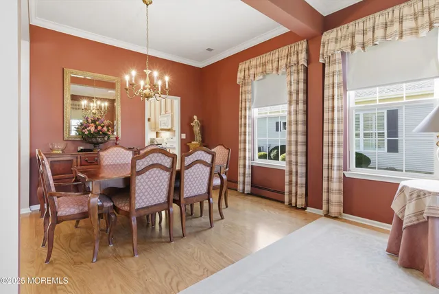 a view of a dining room with furniture window and outside view