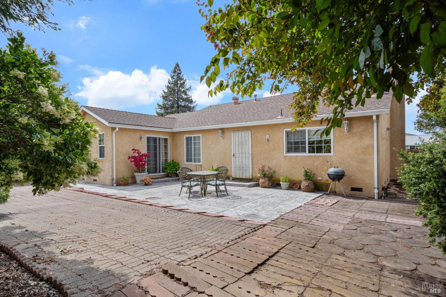 971 Eleanor Avenue Rohnert Park, CA 94928 - Photo 21 of 25 a front view of house with yard and seating area