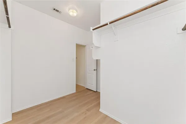 a view of small space with racks on the wall