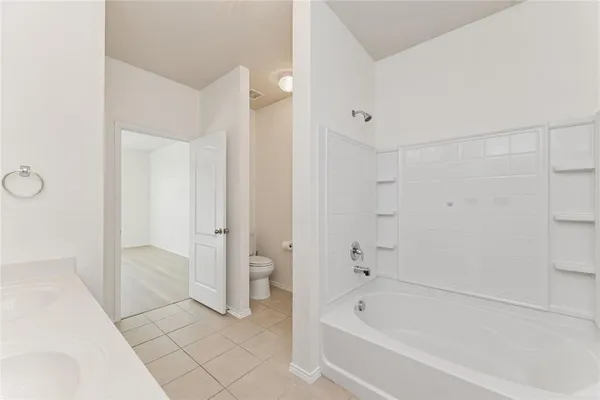 a bathroom with a sink vanity and mirror