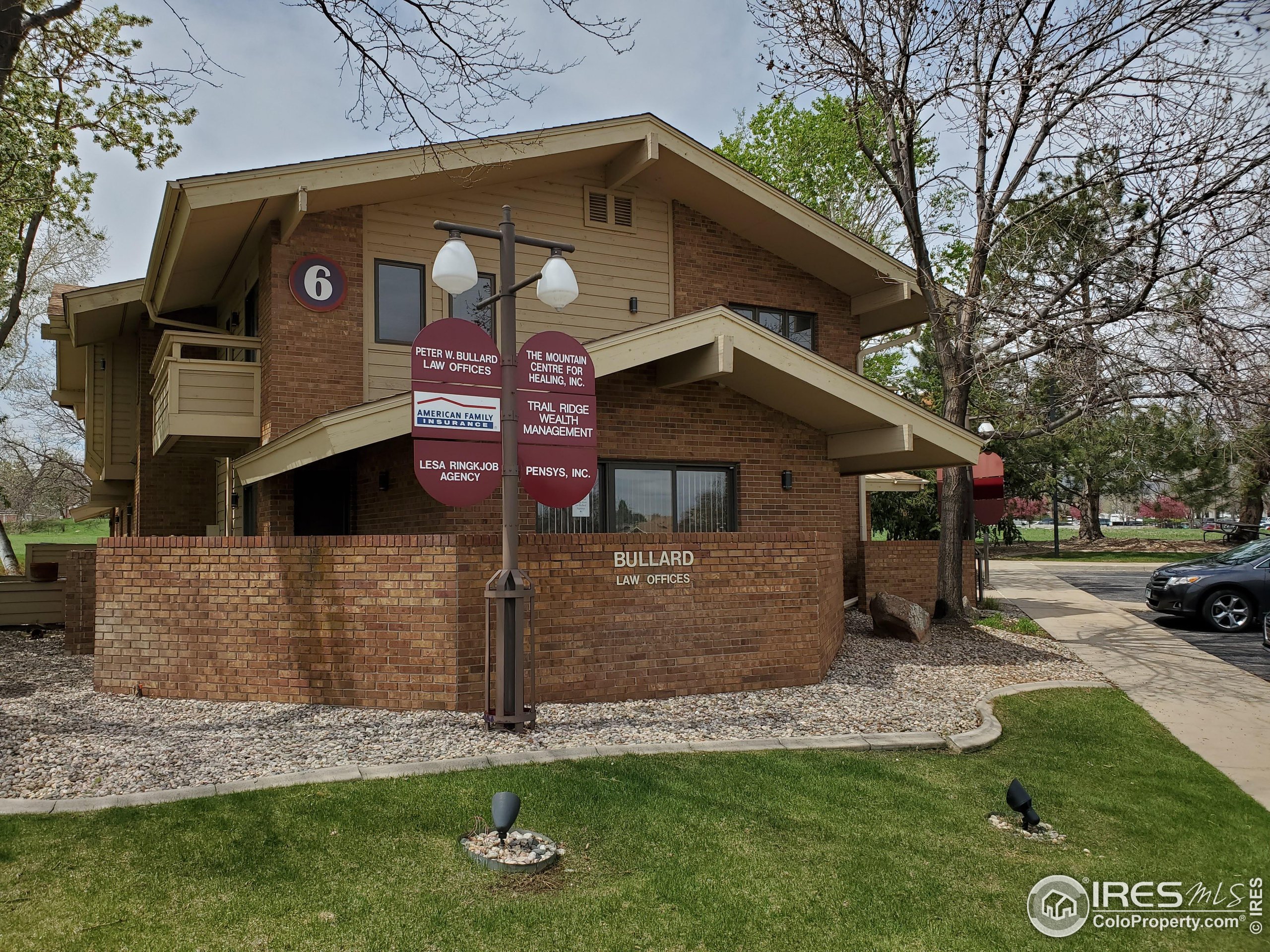375 East Horsetooth Road Fort Collins, CO 80525 - Photo 2 of 4 a front view of a house with a yard