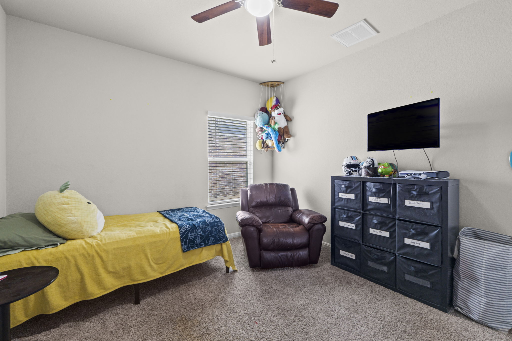 2417 Bridges Ranch Road Georgetown, TX 78628 - Photo 12 of 36 Carpeted bedroom with ceiling fan and baseboards