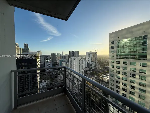 a view of a balcony with city view