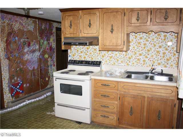 239 Chestnut Ridge Road Mount Airy, NC 27030 - Photo 11 of 13 Kitchen. Kitchen or canning room in basement