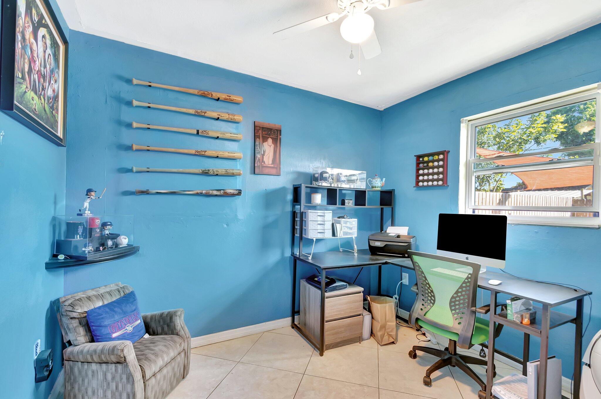 3890 Ocala Road Lake Worth, FL 33462 - Photo 16 of 29 a work room with furniture and a window
