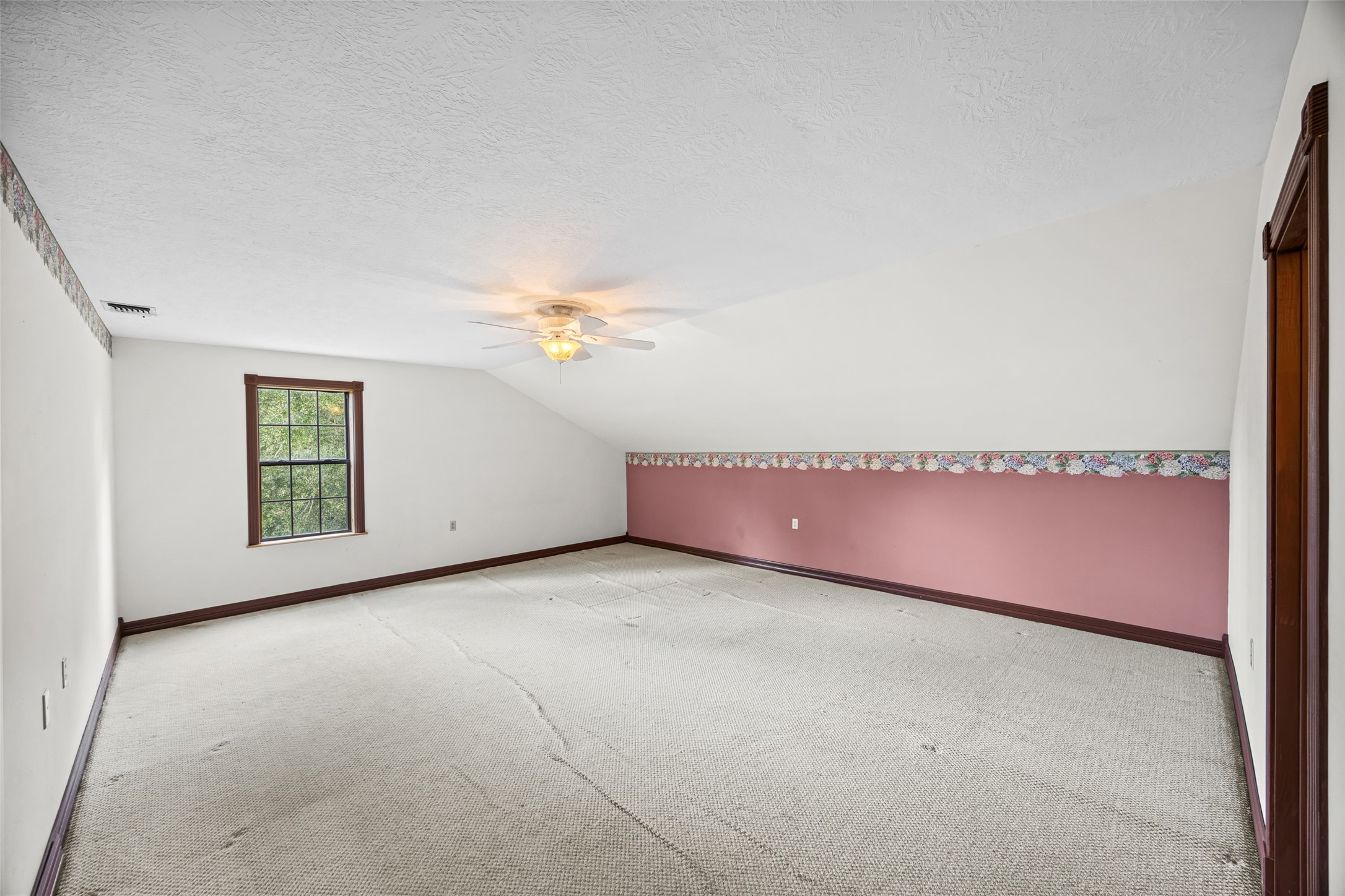 7 Northwood Country Road Huffman, TX 77336 - Photo 35 of 50 an empty room with windows