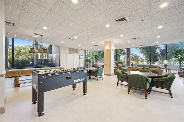 a kitchen with stainless steel appliances granite countertop refrigerator sink and stove