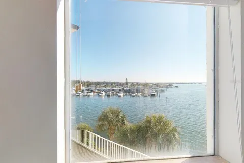 a view of a swimming pool and an outdoor space