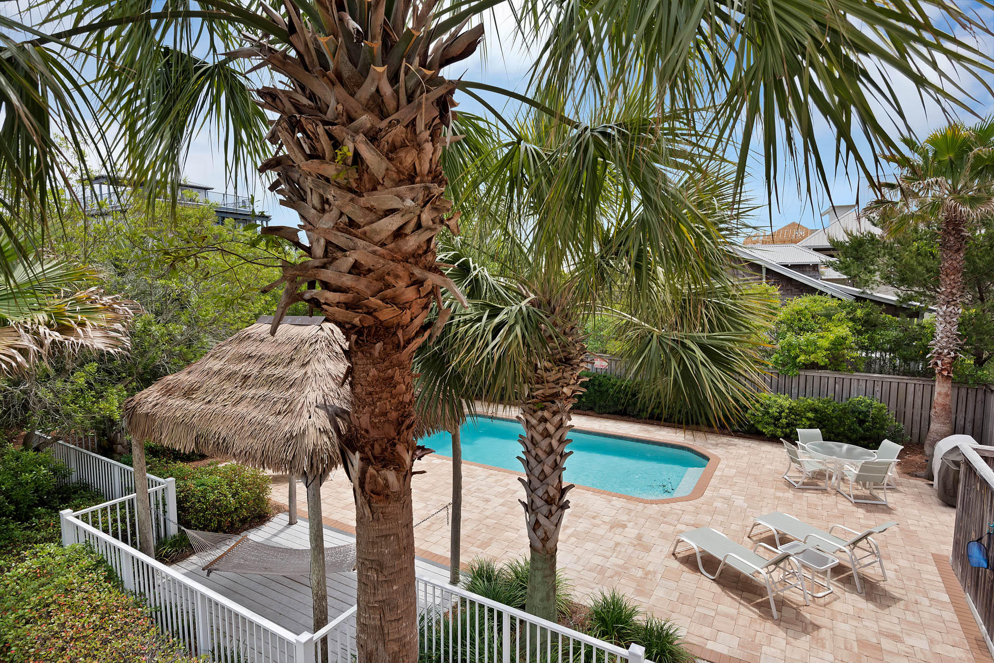 111 Sand Dunes Road Santa Rosa Beach, FL 32459 - Photo 3 of 36 a backyard of a house with seating space