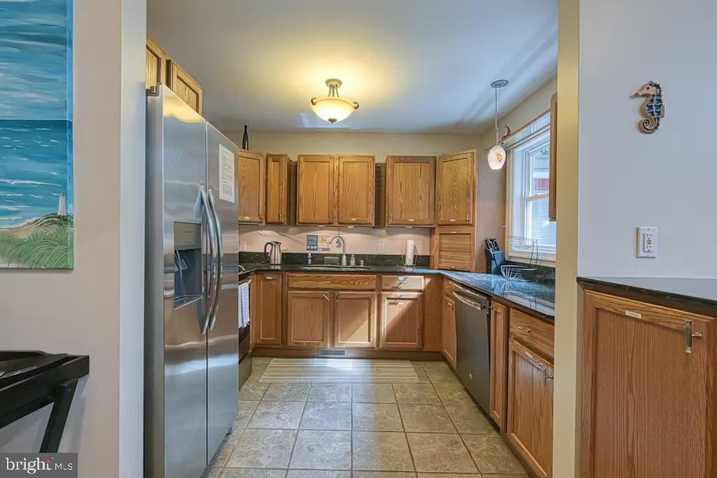 68 Emma Jane Lane Bumpass, VA 23024 - Photo 11 of 48 a kitchen with stainless steel appliances granite countertop a refrigerator and a sink