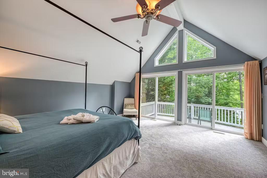 68 Emma Jane Lane Bumpass, VA 23024 - Photo 20 of 48 a bed room with a bed and a large window