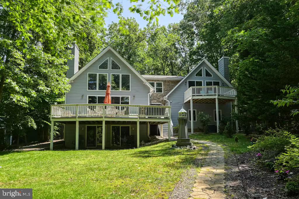 68 Emma Jane Lane Bumpass, VA 23024 - Photo 7 of 48 a front view of a house with a yard